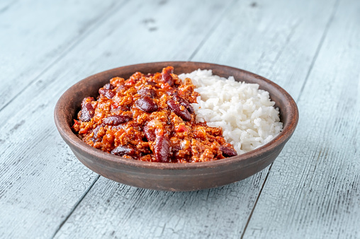 Chili con carne served with white long-grain rice