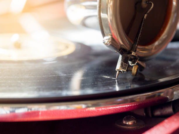 istock Old gramophone close-up. Outdated equipment. 1353857249