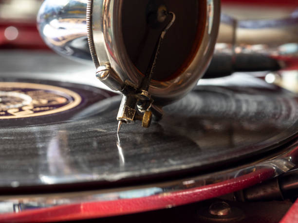 istock Old gramophone close-up. Outdated equipment. 1353857251