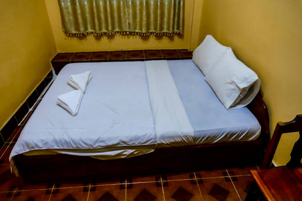 istock pillows on bed, digital photo picture as a background 1353857337