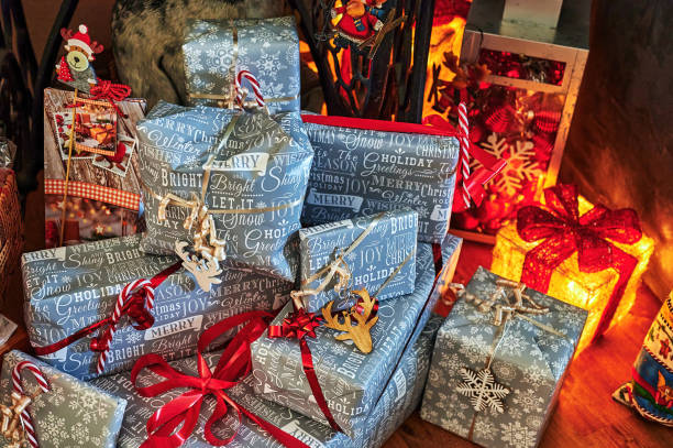 istock Many packed Christmas presents with decoration. 1353857740