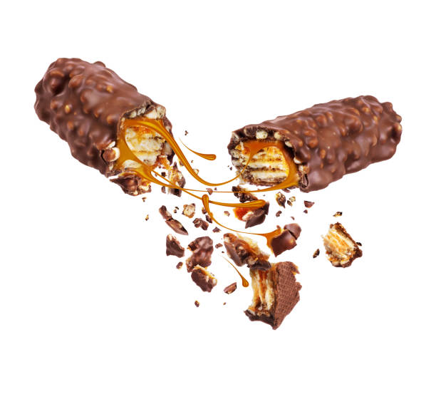 istock Waffle chocolate bar crushed in the air into two halves on a white background 1353861640