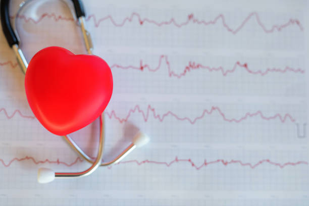 istock Stethoscope and heart on the diagramm 1353863364