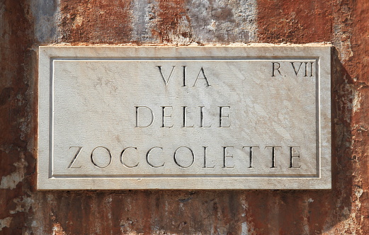 Old street sign at Zoccolette Street in Rome, Italy