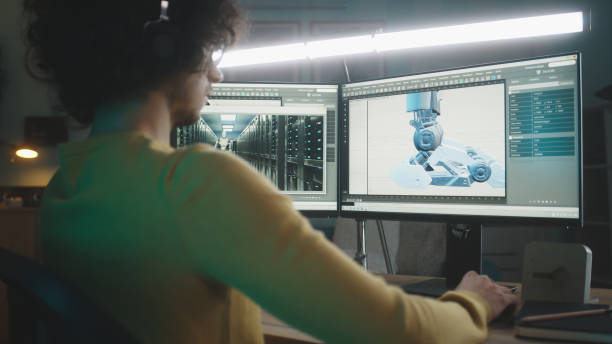 istock Male designer creating 3D model of robot 1353865762