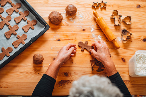 Flat Lay Grandmother Making Gingerbread Cookies For Her Grandchildren