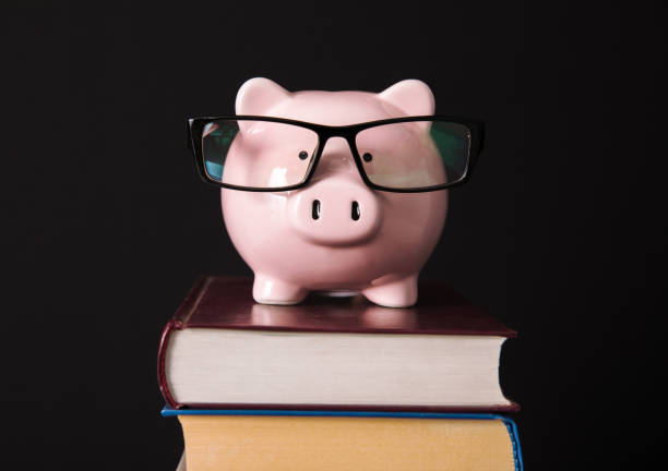istock piggy bank on the books 1353868102