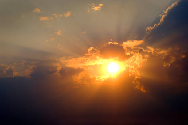 istock Sunlight sun rays shining through clouds in sky symbolizing hope and redemption 1353872309