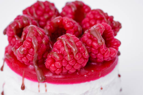 Fresh cake with raspberries in powdered sugar. Dessert in a cafe for breakfast. High quality photo
