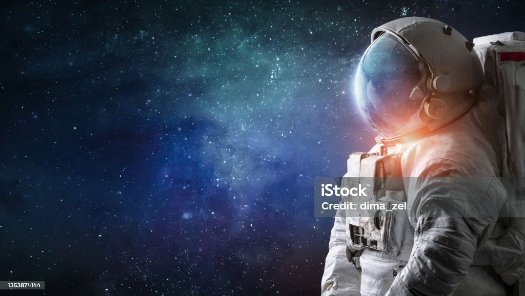Astronaut in outer space. Spaceman with starry and galactic background. Sci-fi digital wallpaper Astronaut in outer space. Spaceman with starry and galactic background. Sci-fi wallpaper Astronaut Stock Photo