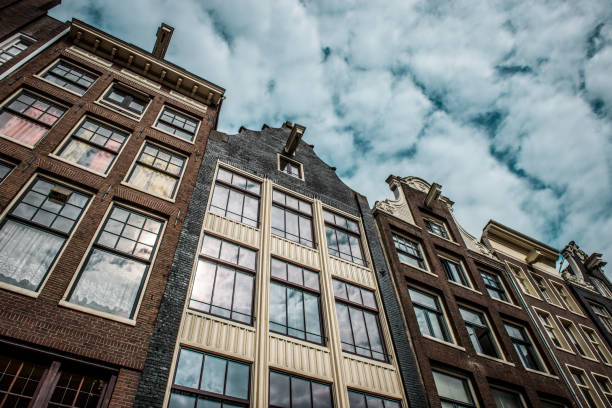 Beautiful Buildings In Amsterdam, The Netherlands Seen From A Low Angle