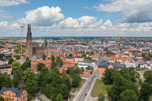 Aerial view of the city of Uppsala in the Uppland region of Sweden. On the left is Uppsala Cathedral, the tallest church in the nordic countries and dating from the 13th century.