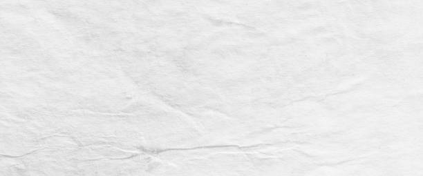 istock Bright paper, white paper texture as background or texture. 1353892504