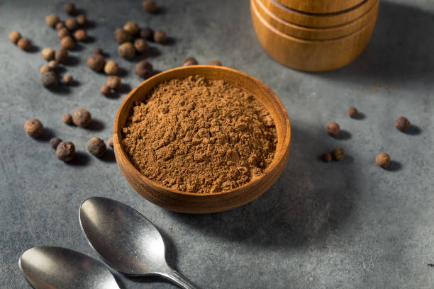 Organic Dry Ground Allspice Organic Dry Ground Allspice in a Bowl allspice stock pictures, royalty-free photos & images