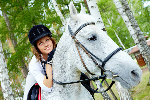 istock Female on horse 135390015