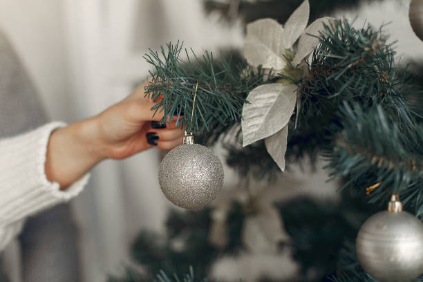 istock People in a winter clothes in a christmass atmosphere 1353927193