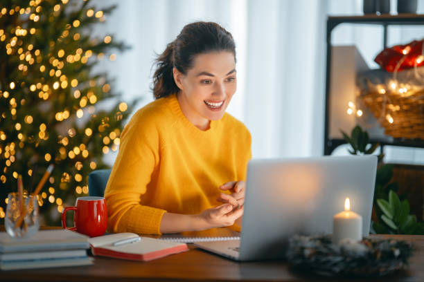 istock Woman working in home office before Christmas 1353929440