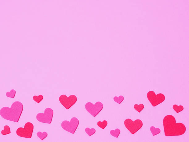 istock Pink background with lots of hearts. 1353935813