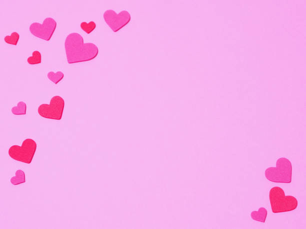 istock Pink background with lots of hearts. 1353935819