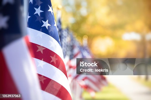 istock Closeup of an American flag in a row 1353937063