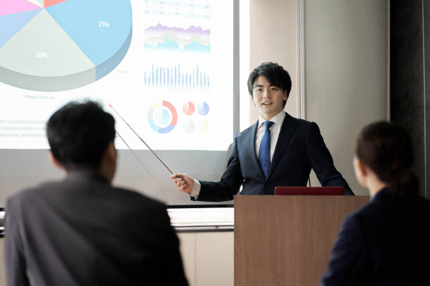 Asian businessman giving a presentation at a conference