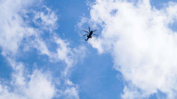 istock A low angle shot of a helicopter in the sky 1353940180