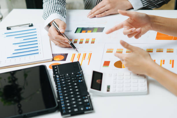 istock Business team meeting to conference, collaboration discussing working analyzing with financial data and marketing business strategy project, presentation and brainstorming to making profit of company 1353947100