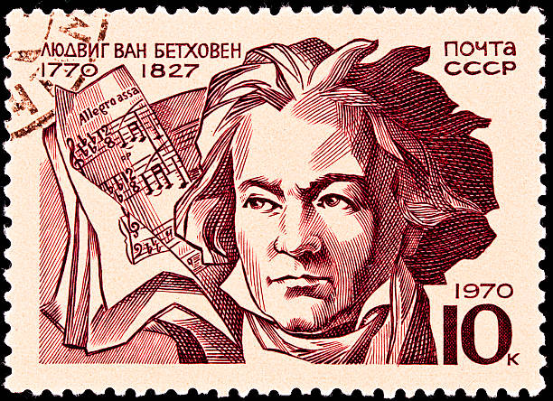 Ludwig Von Beethoven Score Allegro Assai USSR- CIRCA 1970:  A stamp printed in the USSR shows a portrait of Ludwig Von Beethoven and a score marked Allegro Assai, circa 1970. ludwig van beethoven stock pictures, royalty-free photos & images