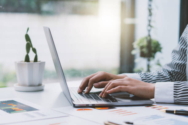 istock strategy analysis concept, Businessman working financial Manager Researching Process accounting calculate analyse market graph data stock information review on the table in office. 1353948206
