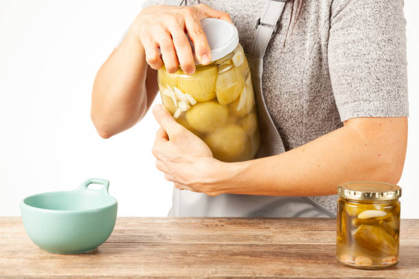 istock opening a jar of pickle 1353948219