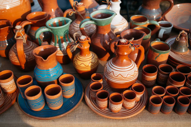 istock Traditional jug and drinking cups 1353948922