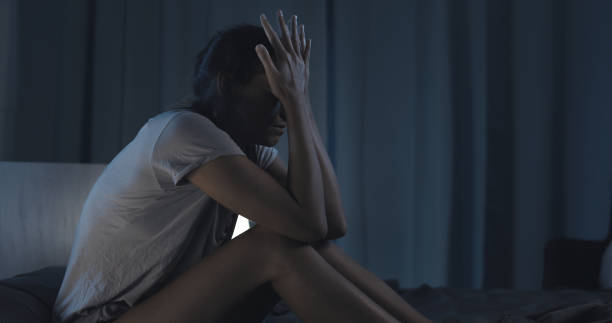 istock Sad woman suffering from insomnia 1353954362