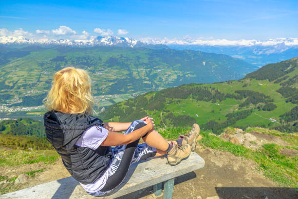 istock Woman on Plessur Alps in Grisons 1353957177