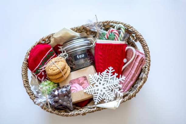 istock Preparing self care package. Seasonal gift box with items for tea drinking. Flat lay. Copy space 1353957940