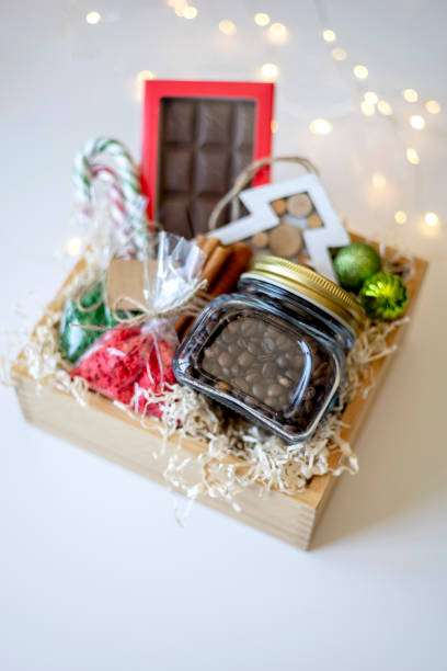 istock Preparing self care package. Seasonal gift box with items for coffee drinking. Copy space 1353958171