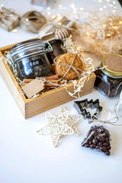 istock Preparing self care package. Seasonal gift box with items for coffee drinking. Copy space 1353959305