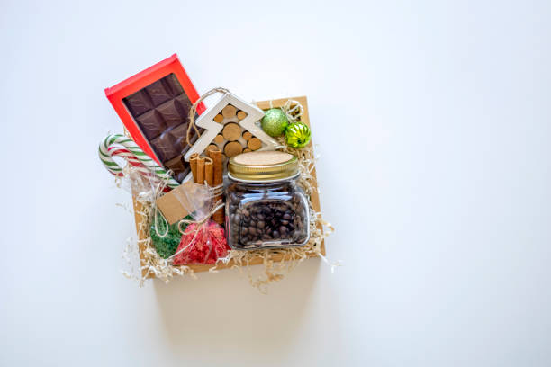 istock Preparing self care package. Seasonal gift box with items for coffee drinking. Flat lay. Copy space 1353959312