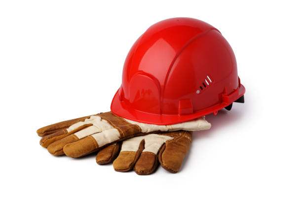 istock Safety hardhat and work gloves isolated on white background 1353962399