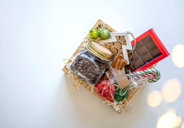 istock Preparing self care package. Seasonal gift box with items for coffee drinking. Flat lay. Copy space 1353963825