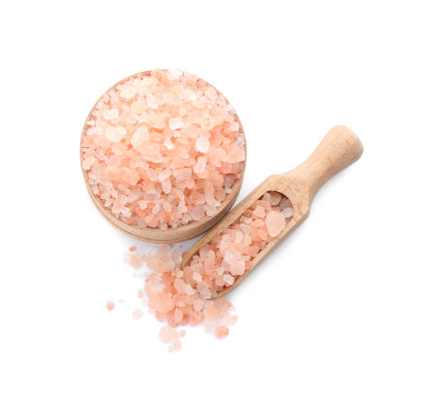 istock Bowl and scoop with pink himalayan salt on white background, top view 1353965586