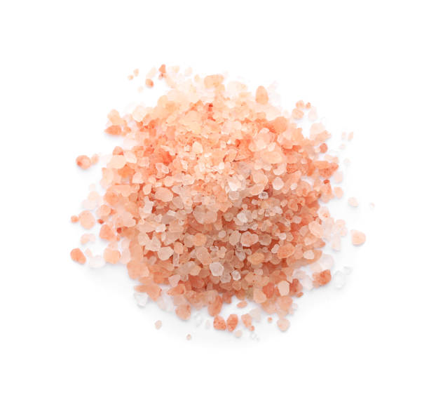 istock Pile of pink himalayan salt isolated on white, top  view 1353965715
