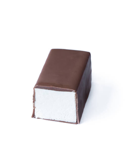istock souffle candy in chocolate isolated on white background 1353965735