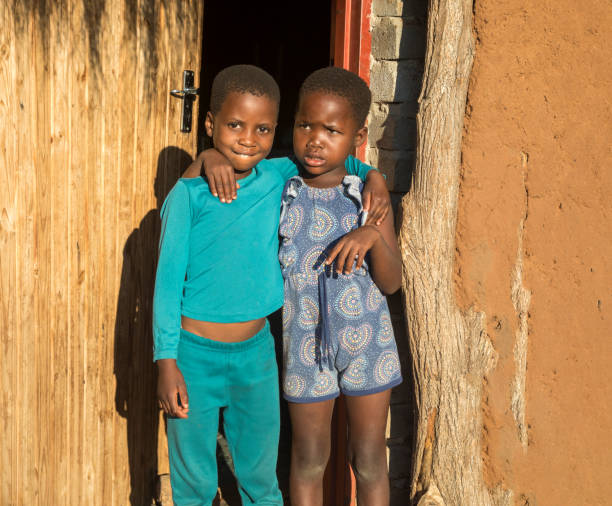 istock African village children siblings 1353967158