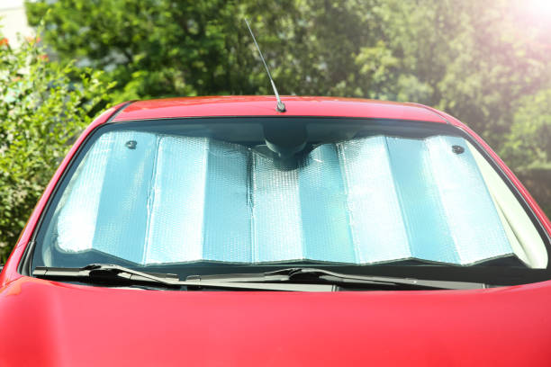 istock Sun shade under windshield in car, closeup. Heat protection 1353968816