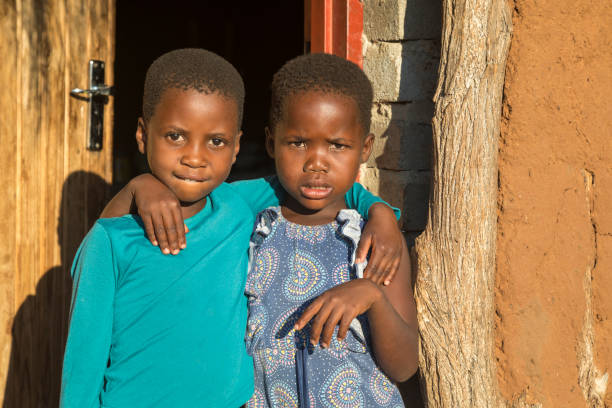 istock African village children siblings 1353969490