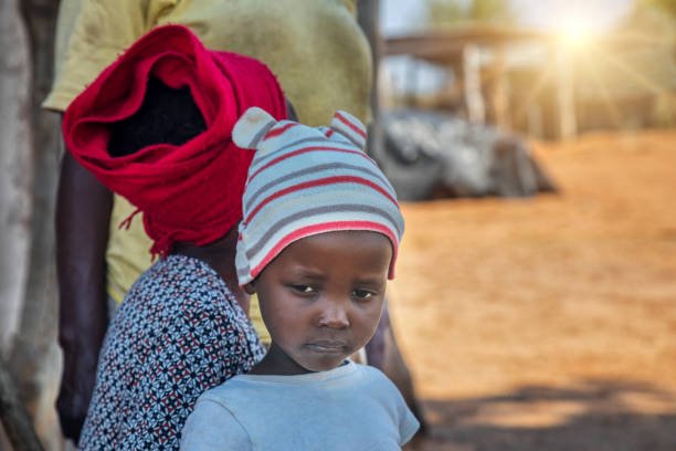 istock African child in a village in Botswana 1353970228