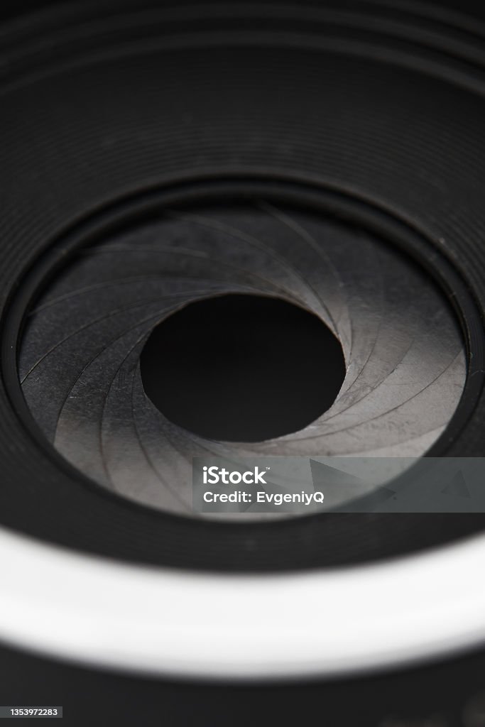 Additional aperture for a photo lens. Photography of Circular Aperture Diaphragm Additional aperture for a photo lens. Photography of Circular Aperture Diaphragm. Aperture Stock Photo