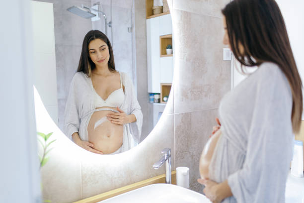 istock Young woman enjoying being pregnant. 1353972542