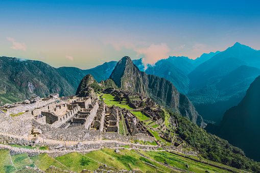 Tourists Exploring Machu Picchu Inca Stone Ruins Peru South America
