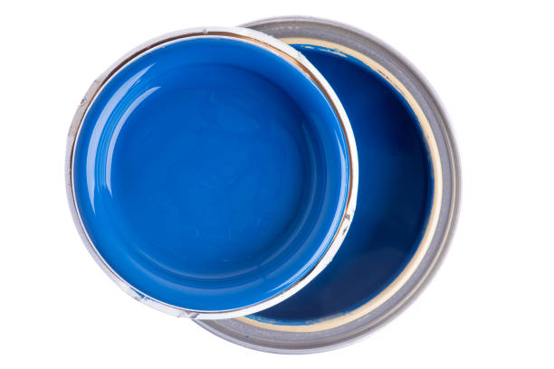 istock Opened can of paint isolated on white background 1353975873